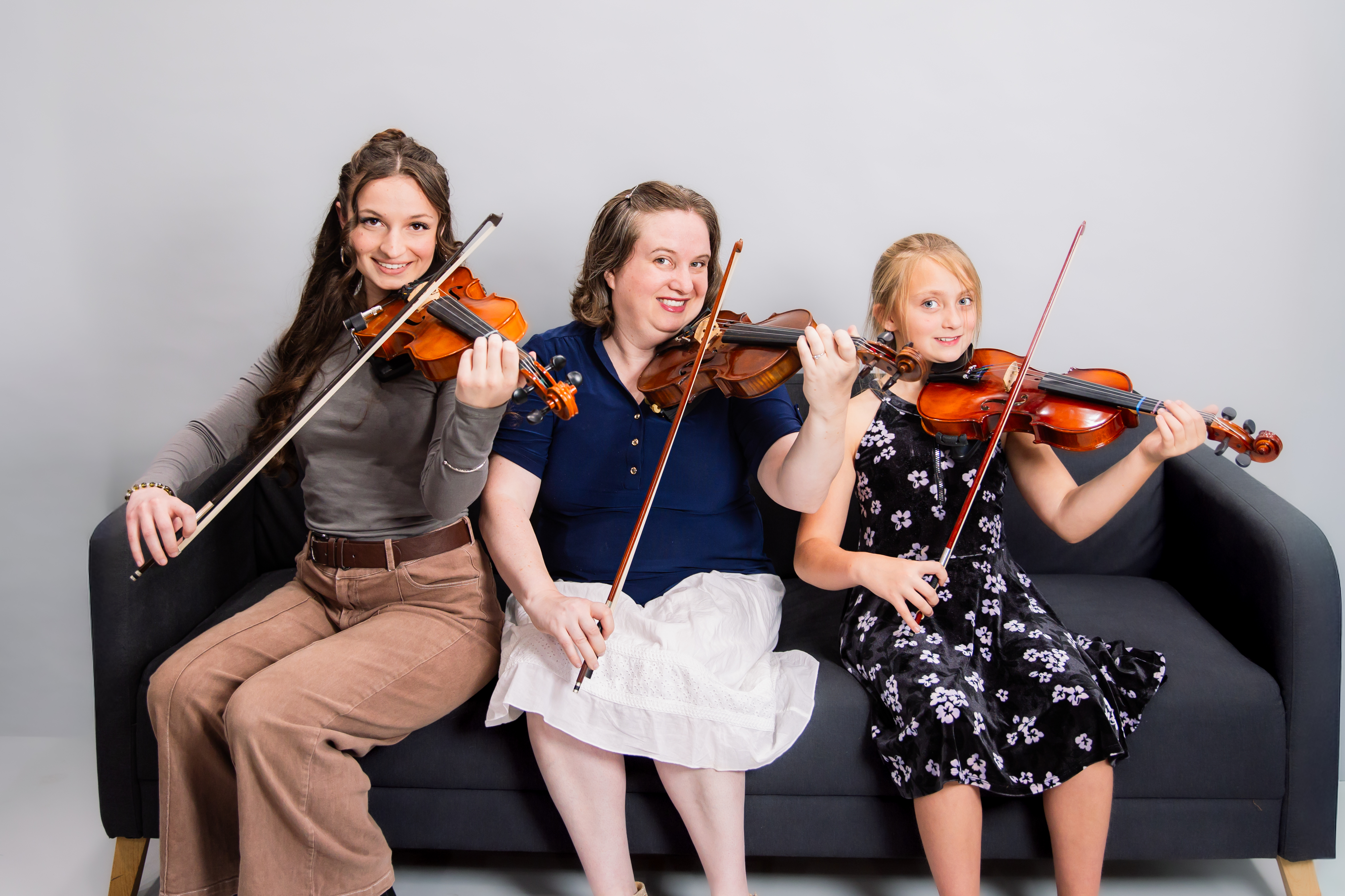 Picture of violin teachers and student